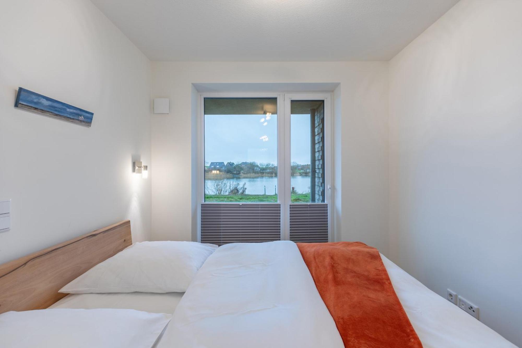 נורדסטרנד Ferienwohnung "Halligstork" Direkt Am Nordseedeich Mit Blick Auf Den See מראה חיצוני תמונה